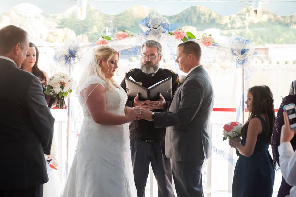 Bride and groom wedding ceremony on the Star of Knoxville riverboat